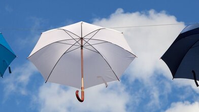 Umbrellas in the clouds