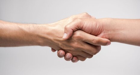 Two hands shaking