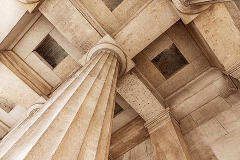 Pillars of old building holding up roof