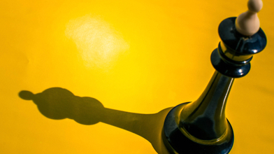 King chess piece with shadow